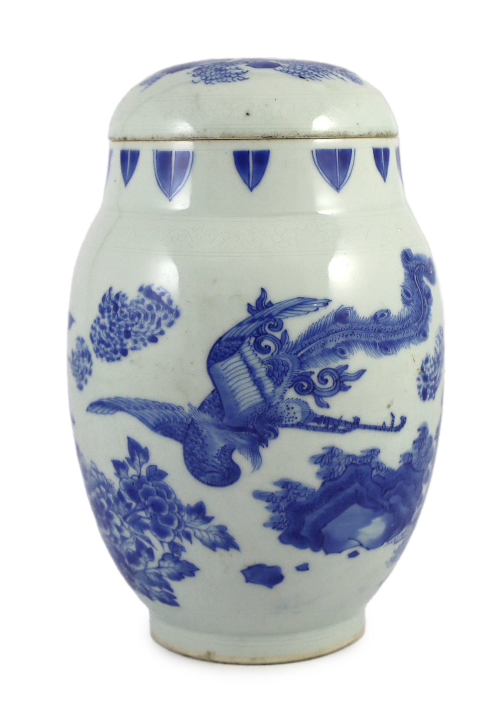 A good Chinese Transitional blue and white ‘qilin and phoenix’ jar and cover, lianzi guan, Chongzhen period (1627-1644), chips to inner flange of cover